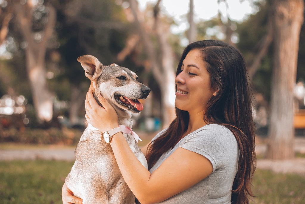 woman and pet love